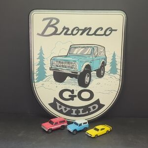 Ford Bronco "Go Wild" wooden sign & die cast fords cars